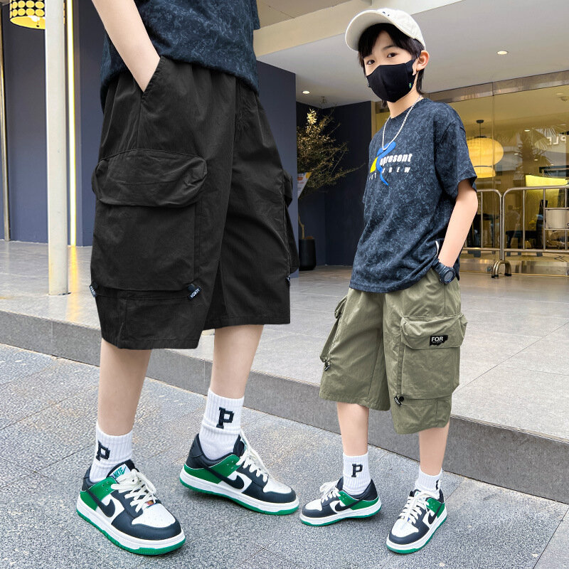 Celana pendek anak laki-laki, Bawahan kasual gaya Korea pinggang elastis sederhana siswa warna polos longgar, 5-12 tahun musim panas