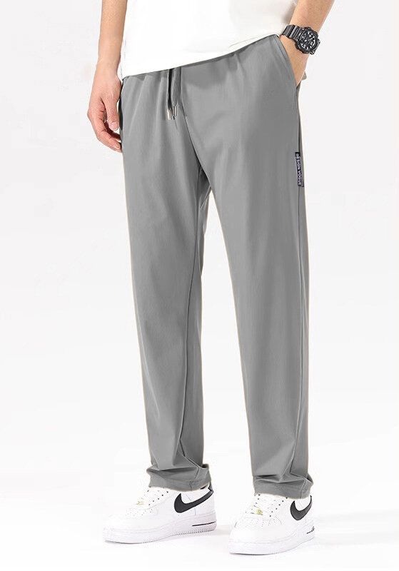 Męskie spodnie casual cropped, wiosenne i jesienne nowe luźne spodnie z prostymi nogawkami, małe spodnie z mikro elastycznymi nogawkami, wersja koreańska pure c