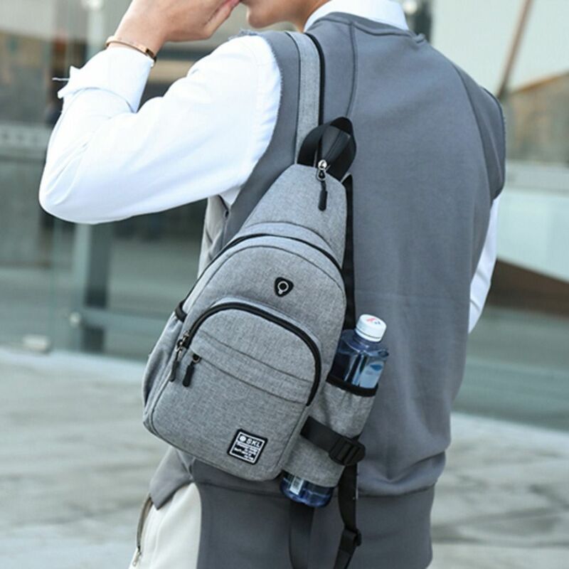 Tas selempang kasual pria, tas dada pria kapasitas besar dengan USB Jack, tas tangan tahan air
