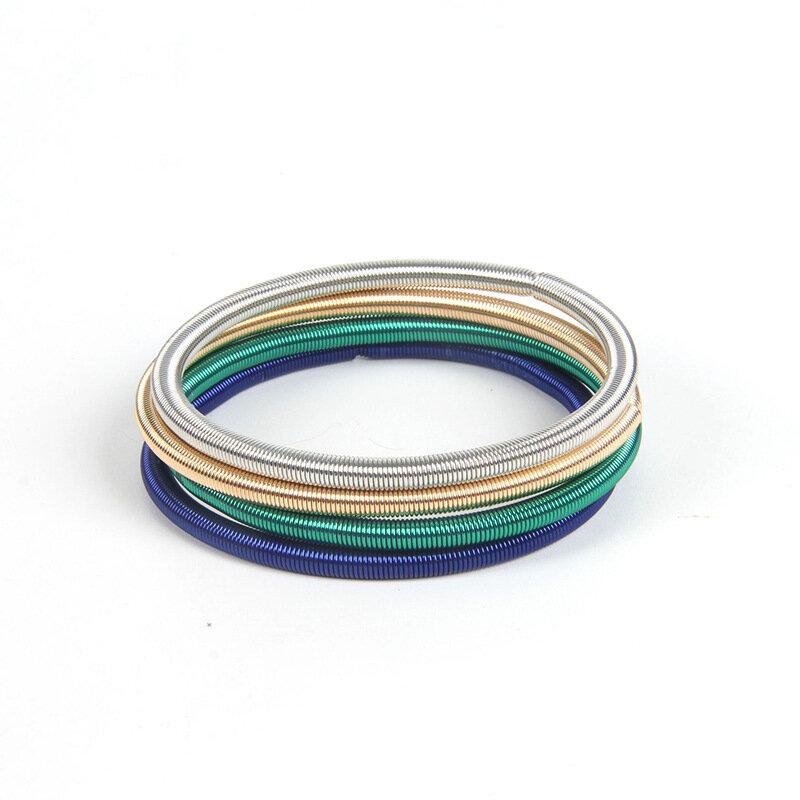 50 pçs anel de aço elástico brinquedo pulseira de pulso decoração massagem primavera pulseira atividade brinquedos descompressão