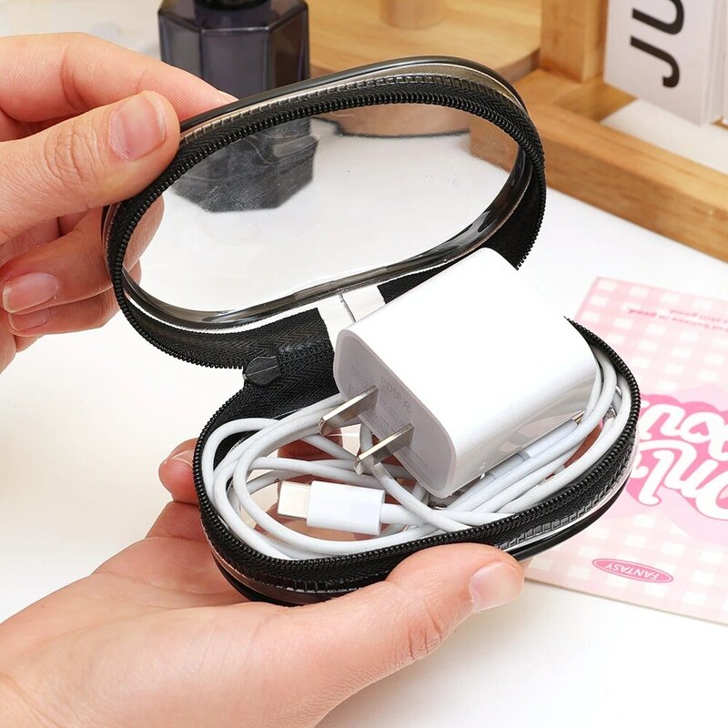 กระเป๋าเก็บสายข้อมูลโปร่งใสแบบพกพาสำหรับชาร์จสาย USB หูฟังเดินทางกันฝุ่นจัดระเบียบกล่องเก็บของแบบใสกลม