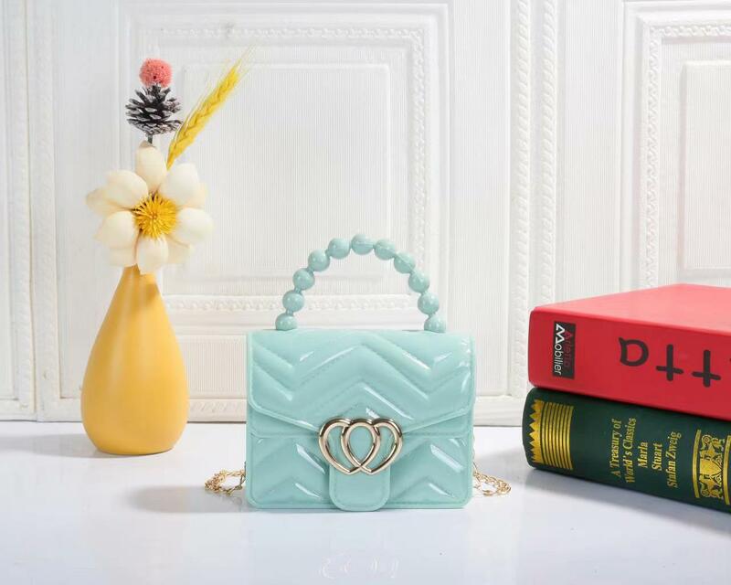 Kids Mini Candy Color Pearl Chain Handle Messenger Bag donna PU Leather Elegant Love Heart Small Shoulder Crossbody Handbag Gift