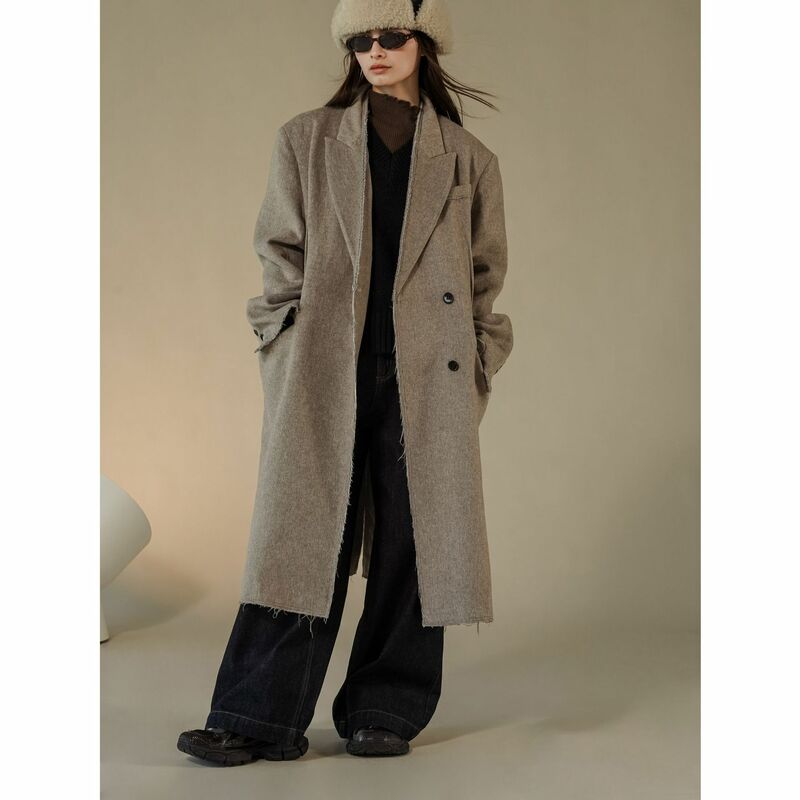 Autumn and winter women's casual solid color single breasted pocket decoration long loose jacket