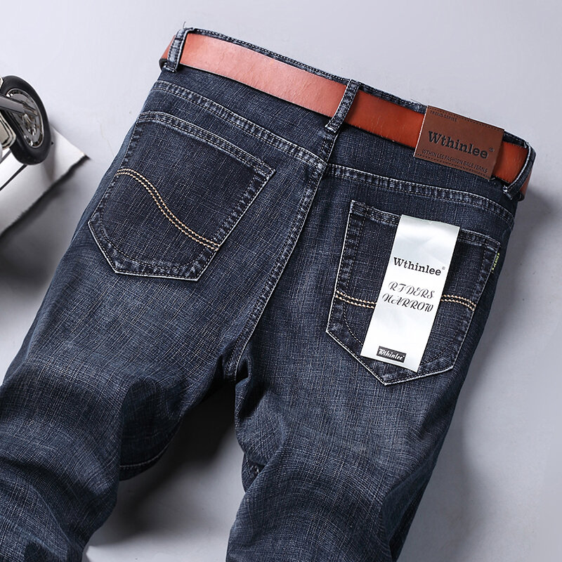 Męskie jeansy biznesowe na co dzień z prostym stretchem modne klasyczny niebieski robocze spodnie męskie WTHINLEE marka odzież rozmiar 28-40