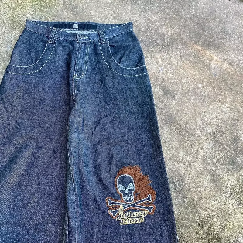 Jeans lavado com crânio bordado com emenda de zíper, marca americana de moda de rua alta, nicho retrô, calça reta solta