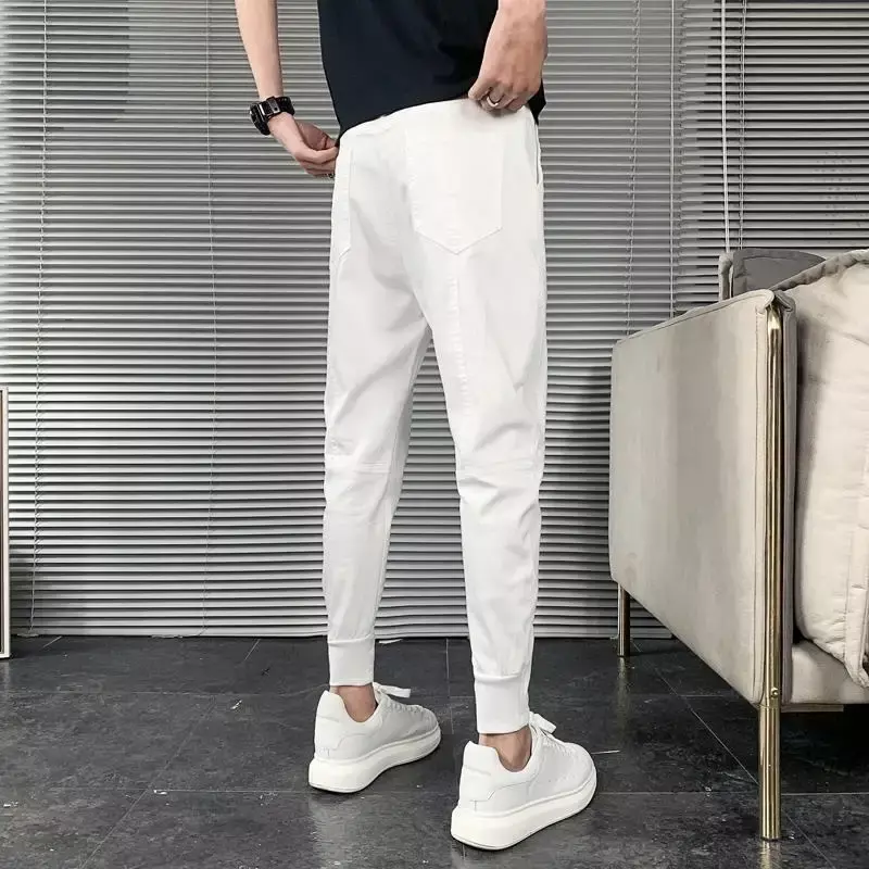 Pantalones informales ajustados para hombre, mallas de cintura alta con bolsillo con cordón, Color negro sólido, moda coreana, novedad de verano