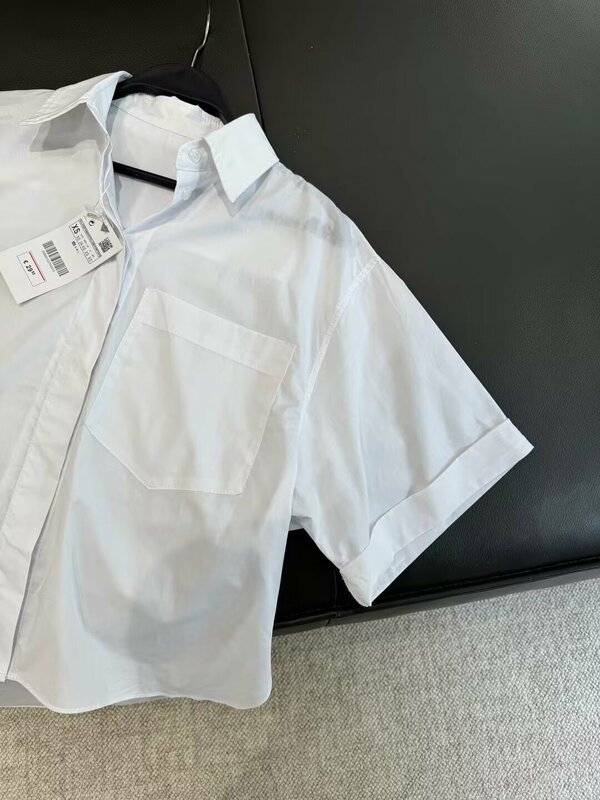 Camisa de popelina asimétrica informal para mujer, camisa de manga corta Retro con botones, decoración de bolso de parche, Top elegante, nueva moda