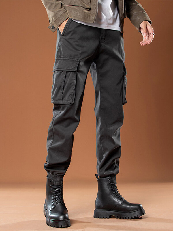 Zimowe spodnie z wieloma kieszeniami Cargo męskie grube polarowa podszewka ciepłe biegaczy męskie Streetwear Casual bawełniane spodnie termiczne