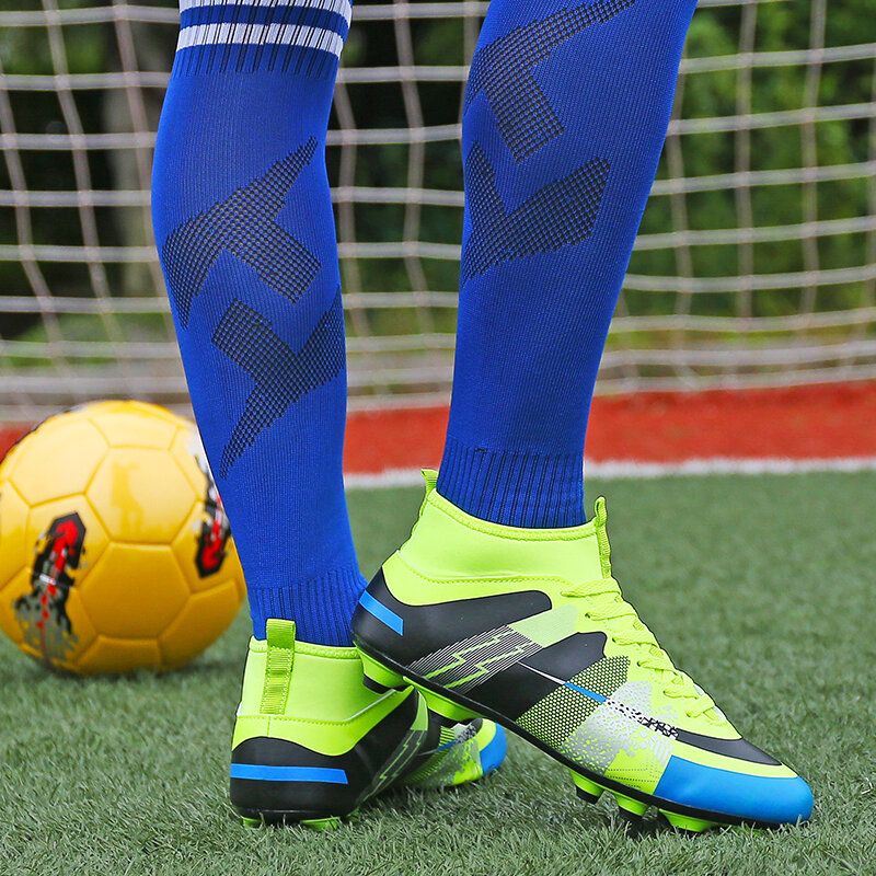 รองเท้ากีฬาเด็ก FG ฟุตบอลราคาถูกสูงสีส้มรองเท้าฟุตบอลเด็กกลางแจ้งรองเท้าฟุตซอลยาวแหลม