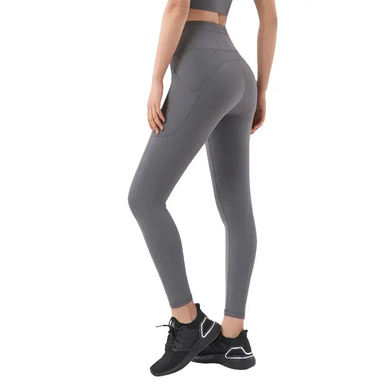 Bolso lateral nu calças de ioga apertadas para mulheres, Europa e América, cintura alta, quadril, pêssego, calças de fitness esportivas