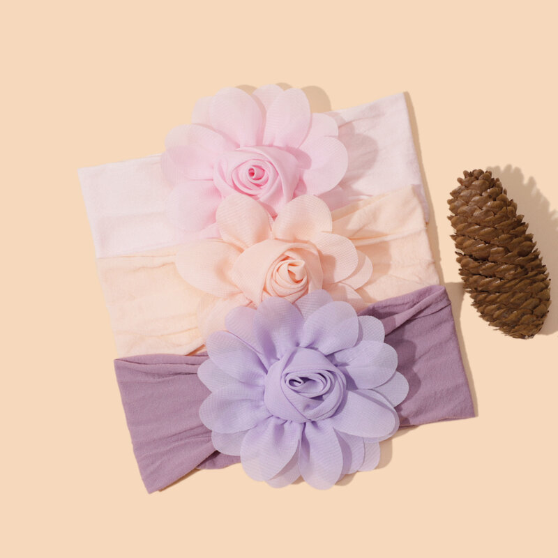 Dziecięca opaska dla dziewczynek kwiat w jednolitym kolorze nylonowa miękka elastyczne nakrycie głowy księżniczka urocza opaska do włosów nowonarodzona akcesoria do włosów dla dzieci