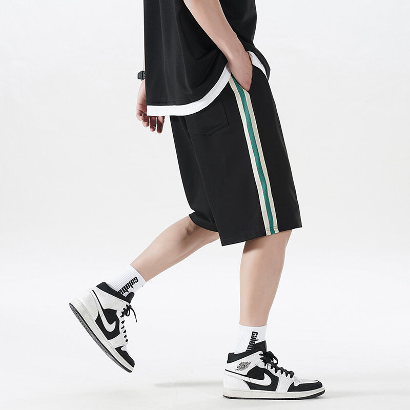 Letnie bawełniane spodenki boczne w paski dla mężczyzn koreańska moda uliczna krótkie spodnie z szerokimi nogawkami męskie sznurkiem w talii odzież sportowa spodenki do biegania