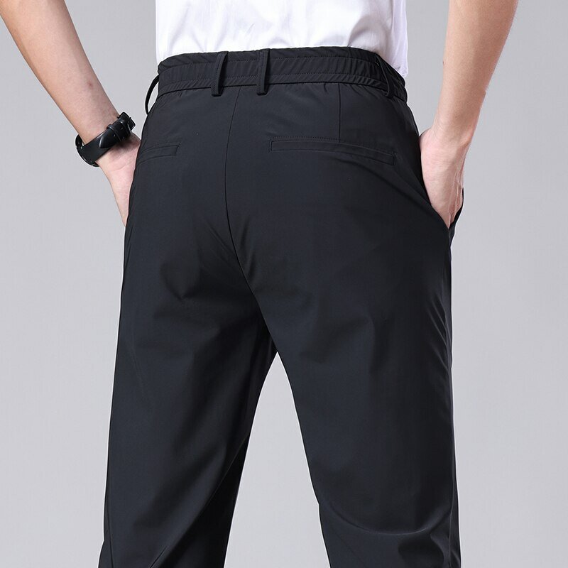 2023 estate pantaloni Casual uomo sottile Business Stretch Slim elastico in vita Jogger coreano classico sottile nero grigio blu pantaloni maschili