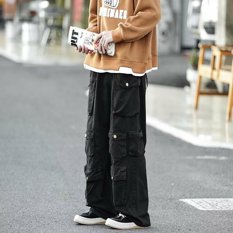 Tuta Multi-tasca popolare da strada pantaloni Casual larghi stile Harajuku da uomo pantaloni Hip Hop da donna retrò High Street