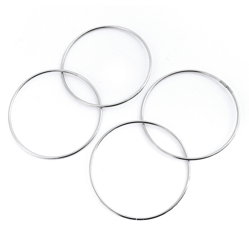 4 buah mainan ajaib cincin logam menghubungkan besi Hoops untuk menyenangkan peralatan bermain trik sulap
