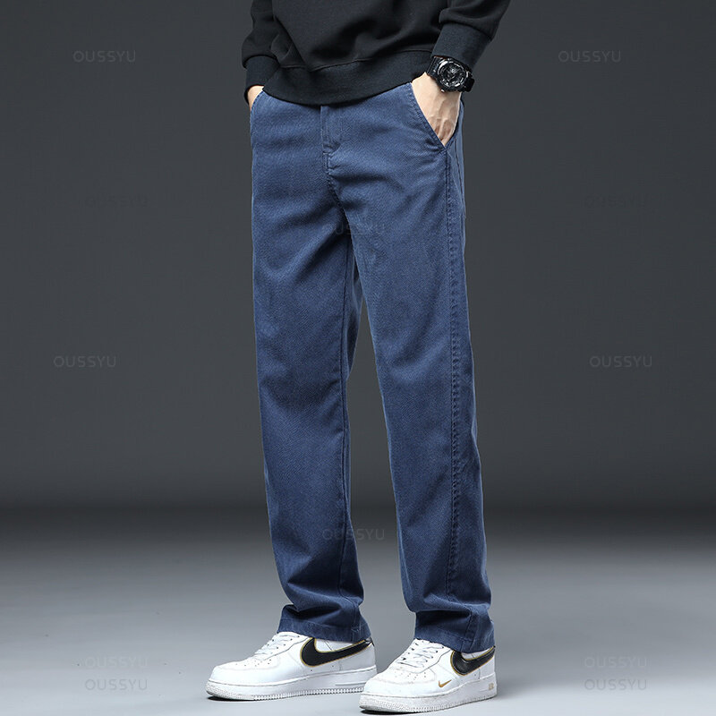2024 New High Quality Soft Lyocell Fabric Jeans Men Elastic Waist Loose Straight Four Seasons Denim Trousers Male Plus Size 5XL
