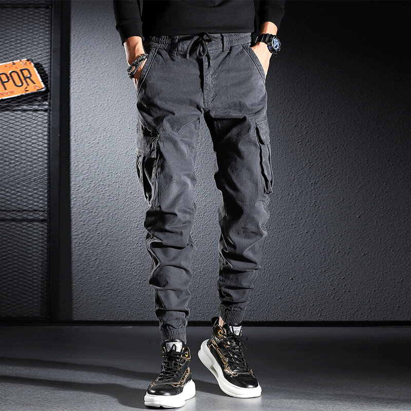 Streetwear moda masculina jeans solto ajuste multi bolsos casuais calças de carga hombre zíper designer hip hop corredores macacão