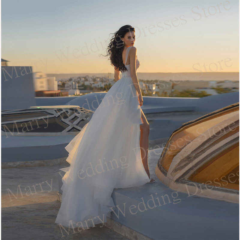 Pełne wdzięku nowoczesne damskie suknie ślubne eleganckie suknie ślubne z koralikami w stylu kochanie seksowne z wysokim wycięciem bocznym فساتين حفلات الزفاف