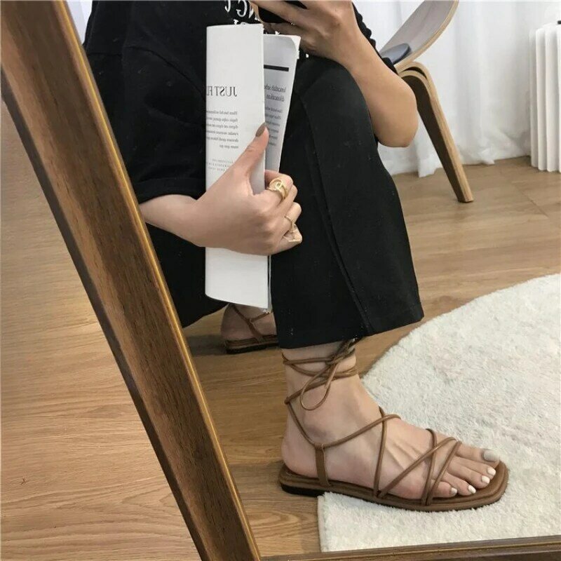 Sepatu musim panas wanita Sandal Fashion seksi Cross-Tie Sandal jari terbuka kasual kasual gaya peri sepatu pita sempit Zapatillas Mujer
