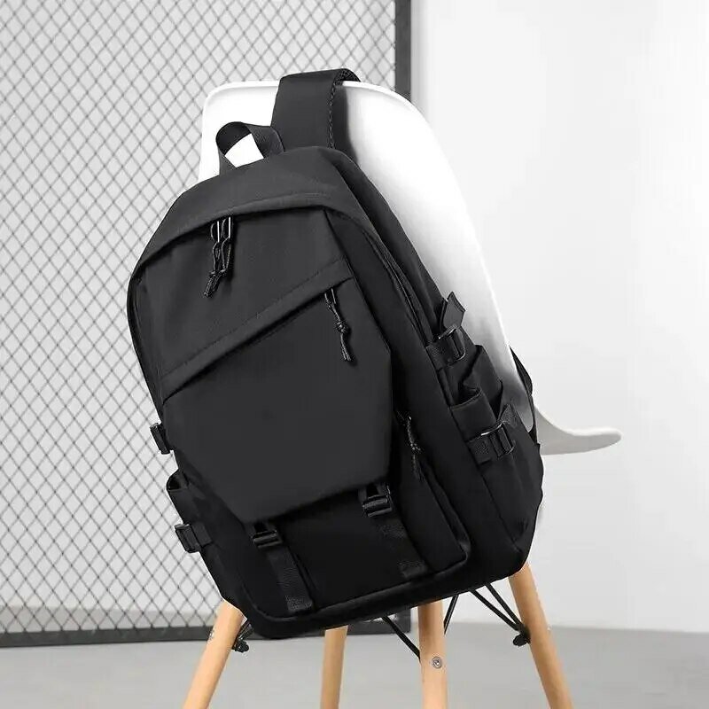 Jeden 15-calowy poliester wodoodporny jednolity kolor Prosty męski plecak Moda para Student Plecak komputerowy