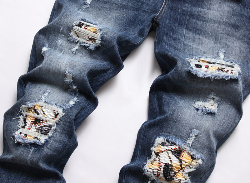 Falten und Löcher in Jeans Männer dehnen schlanke Füße Mode Großhandel Hersteller Direkt vertrieb
