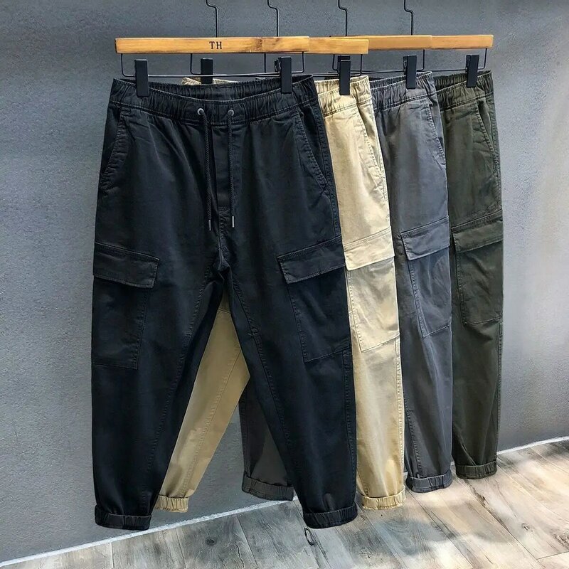 Spodnie z czystej bawełny Wiosna Wiązane stopy Spodnie robocze Mężczyźni Dorywczo Kieszeń Jednolity kolor Luźne koreańskie kieszenie Elastyczne spodnie w talii
