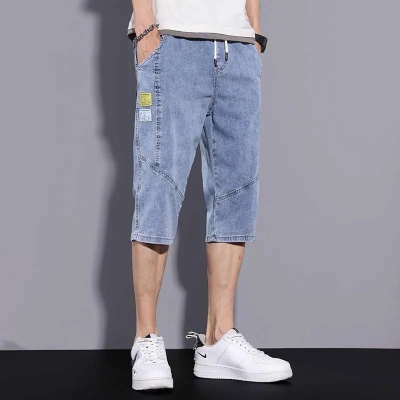Siedem punktów jeansy męskie 2023 letnie cienkie modne młodzieżowe proste nogawki luźne Plus Size średnie spodnie casualowe spodenki jeansowe A3399