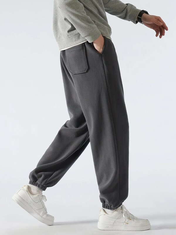 Zimowe grube polarowe ciepłe spodnie dresowe męskie Streetwear Hip Hop szerokie workowate spodnie do biegania ciężkie aksamitne spodnie termiczne Plus Size