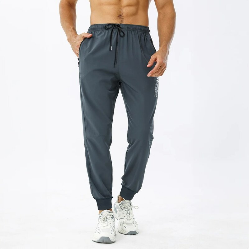 Pantalones de chándal con cremallera y bolsillo para hombre, ropa ajustada para entrenamiento de fútbol y trotar, a la moda, novedad
