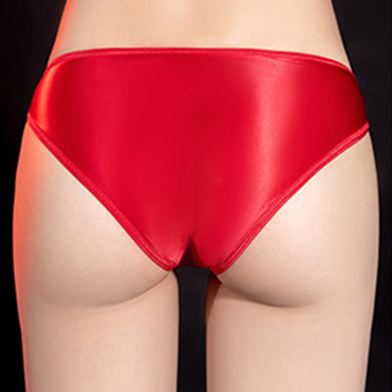 Pakaian dalam seksi untuk pria, celana dalam thong elastis Ultra tipis mengkilat minyak melar tembus pandang berongga untuk pria