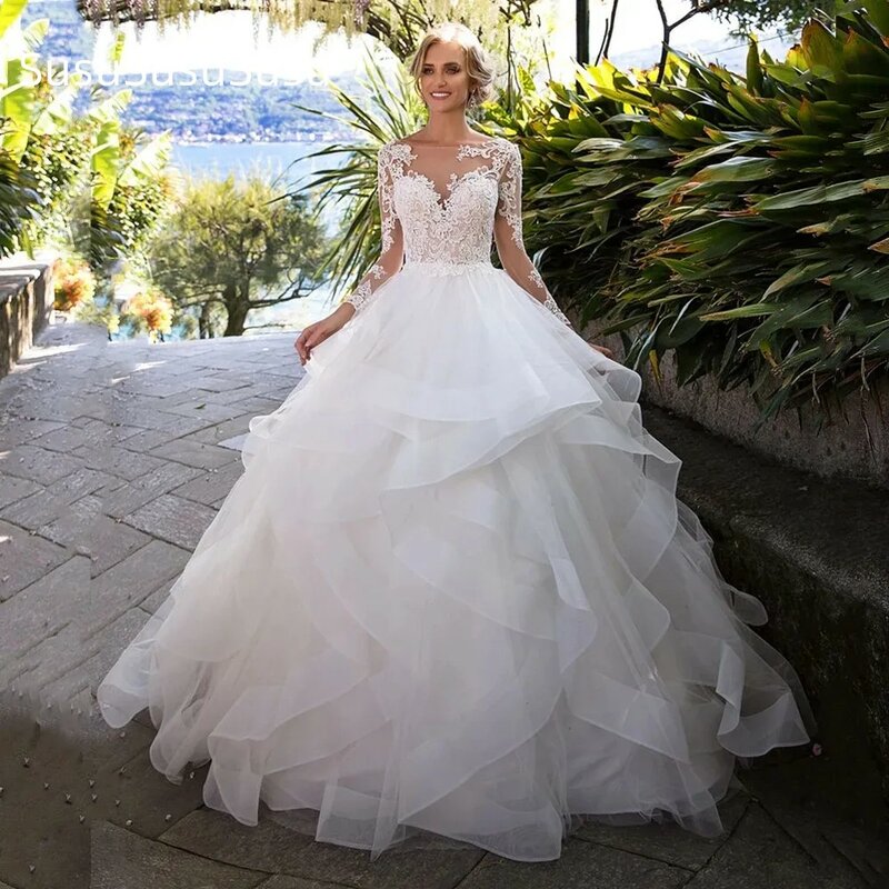 2023 Princess Ball Gown Wedding Dresses with Long Sleeves Lace Appliques Bridal Gowns Backless Ruffles Skirt Vestidos De Noiva