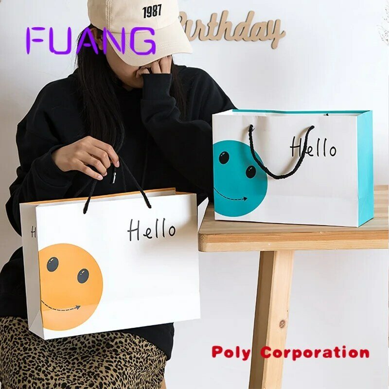 China Fabrikant Ecofriendly Smiley Design Kinderen Cadeau Tas Custom Logo Promotionele Boodschappenverpakking Papieren Zakken