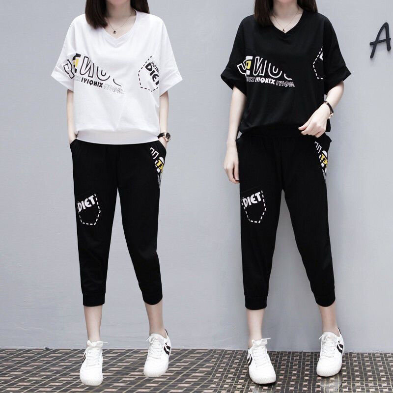 Damska 2024 letnia nowa koreańska wersja dresy koszule z krótkimi rękawami i spodnie do łydek 2 zestawy dwuczęściowe dla kobiet