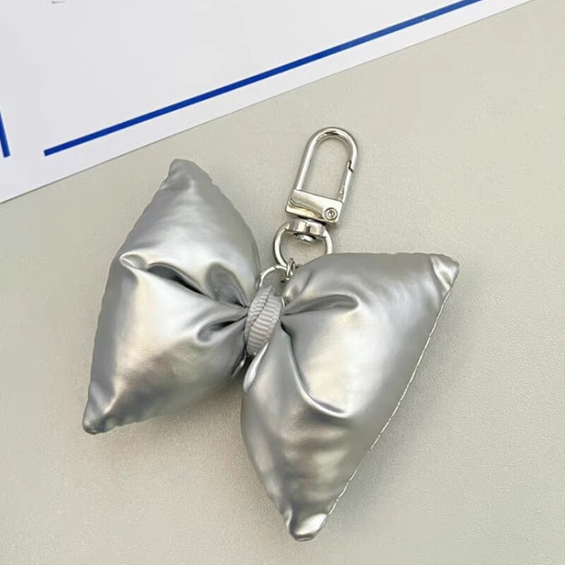 1 szt. Koreański brelok 3D z kokardką modny plecak wisiorek do torby dekoracja Y2K srebrny brelok ze słodką kokardką do kluczy