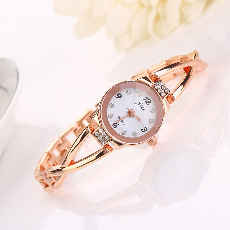Reloj de pulsera de cuarzo para mujer y niña, pulsera de aleación, color oro rosa, a la moda