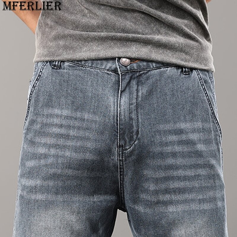 44 Plus Size jeansy męskie spodnie dżinsowe casualowe jednokolorowe jeansy męskie duży rozmiar proste spodnie