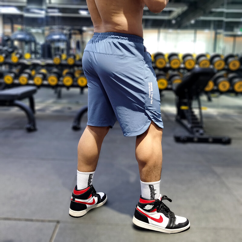 2023 الصيف الرجال تشغيل السراويل مع سستة جيب الراحة سريعة الجافة اللياقة البدنية كمال الاجسام رياضة التدريب قصيرة نصف السراويل
