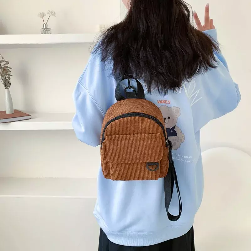 Bolso de terciopelo a rayas para mujer, versión coreana, mochila de compras suave para chica, mochila Simple de Color sólido para estudiante, novedad de 2023