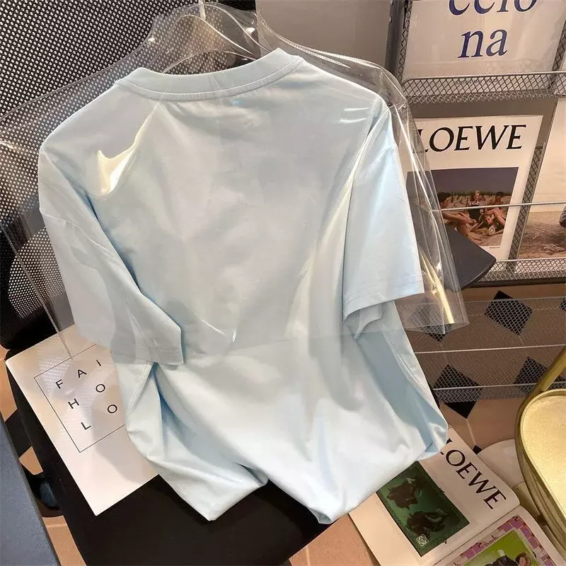 T-shirt de dessin animé mignon pour femmes, Cinnamorolls Kawaii At, mode d'été, conception originale d'étudiant, vêtements de carillon bleu clair, nouveau