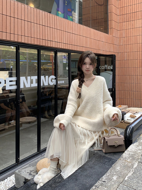 Pullover Frauen solide flauschige Quaste Tops koreanischen Stil Mode All-Match unregelmäßige Strick pullover einfache Freizeit zart süß
