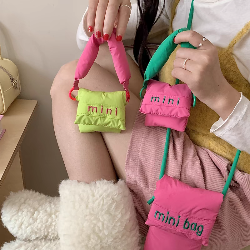 Mini bolsas de auriculares de nailon para mujer, monedero informal protector portátil, bolsas de almacenamiento de moda multifunción, bolso de mano para niña