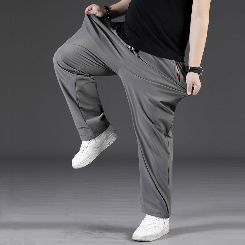 Celana panjang pria ukuran besar 7XL 8XL, celana panjang kasual modis pinggang elastis, celana olahraga ukuran besar 8XL