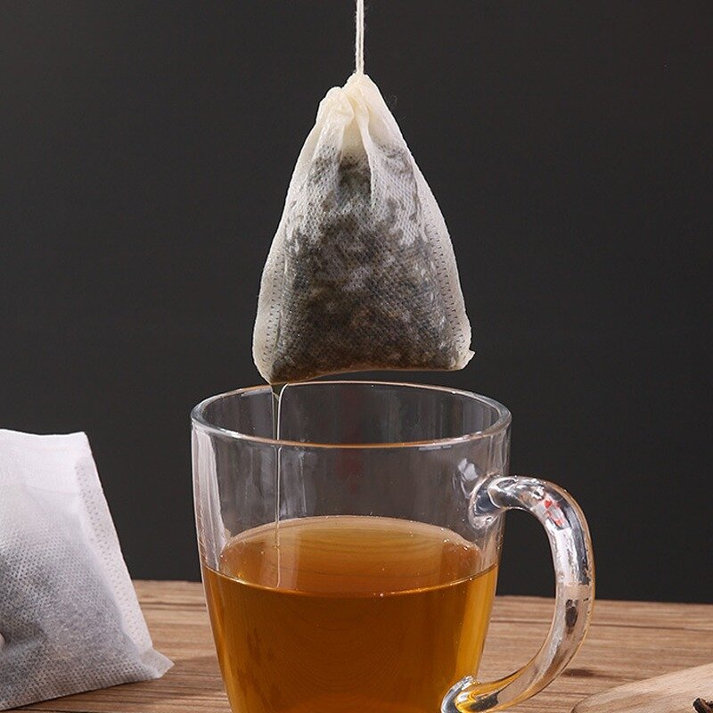 Tas penyaring teh sekali pakai, kantong teh kain tanpa tenun dengan tali serut kertas penyaring dapur untuk paket memasak teh herbal kopi