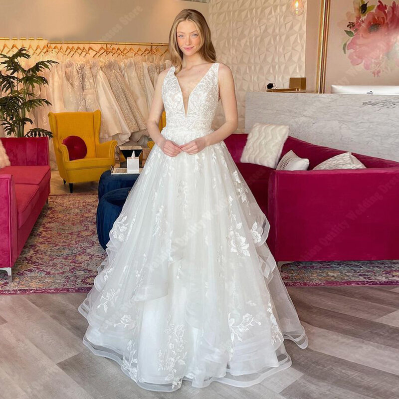 Wysokiej jakości puszysty tiul suknie ślubne bez rękawów suknie ślubne Sexy Deep-V długość Mopping Princess Vestidos De Novias