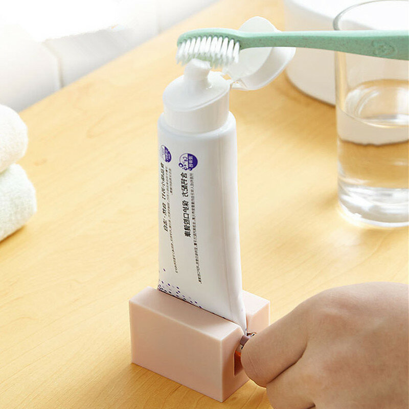 Exprimidor de tubo de pasta de dientes de plástico portátil, dispensador fácil, Soporte rodante, suministros de baño para el hogar, accesorios de limpieza bucal