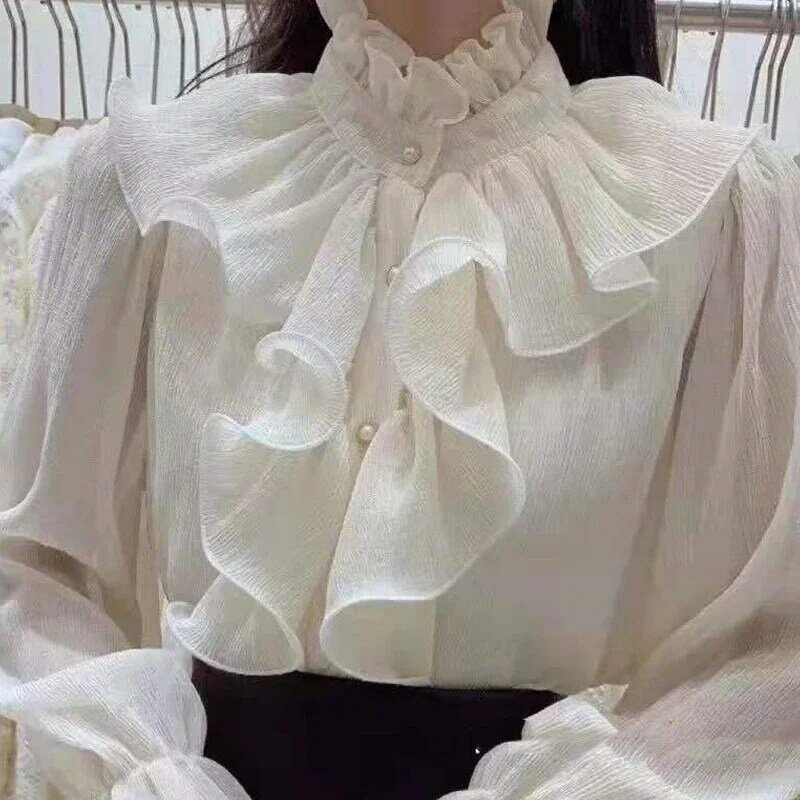 2023 Primavera Ruffle Costura Palácio Blusa Mulheres Longo Alarme Manga Botões Ruched Solto Top Novo Suporte Collar Camisa De Chiffon 12946