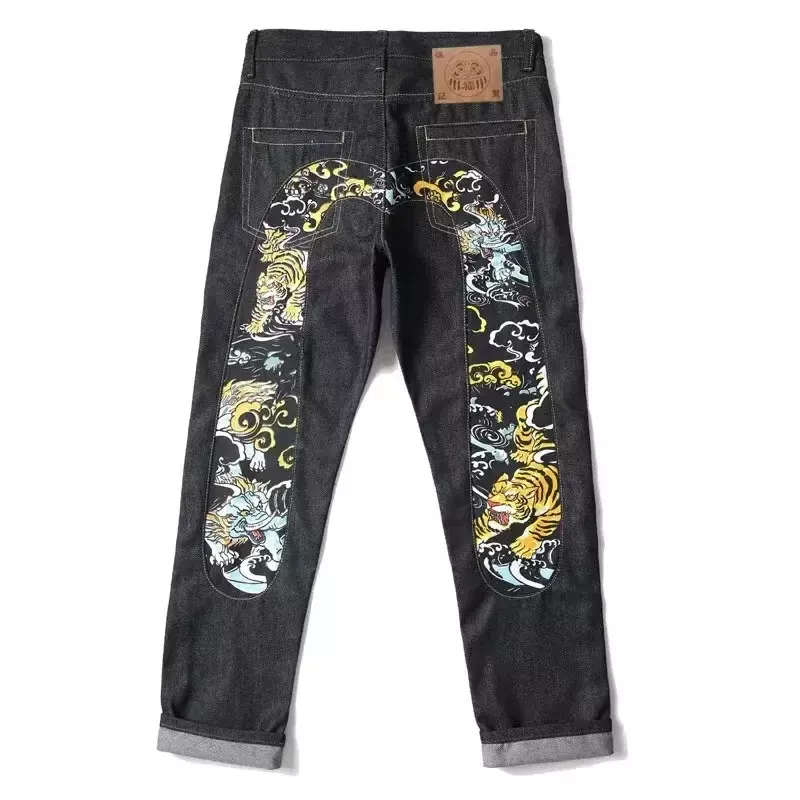Celana panjang Jeans pria, celana panjang kaki lebar lurus ramping merek trendi motif grafiti Hip Hop jins jalanan Eropa Amerika