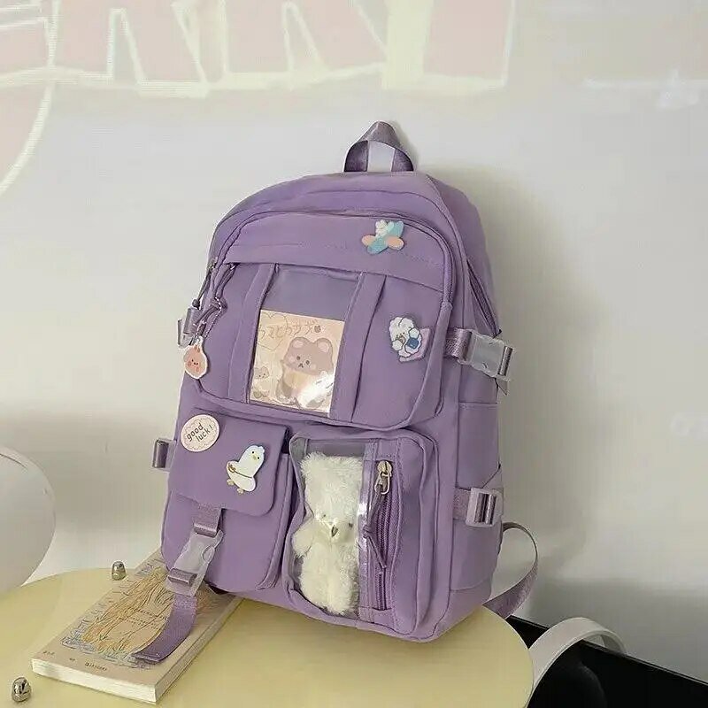 Сумки рюкзака студента средней школы девушек популярного розового пурпурного цвета