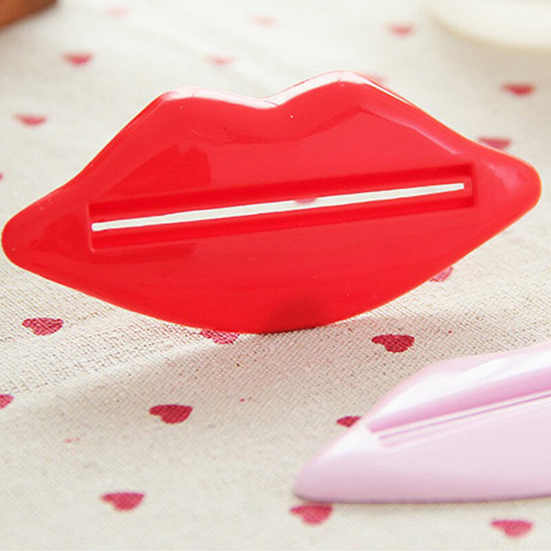 Pemeras pasta gigi serbaguna dua warna pilihan bentuk Novel sederhana untuk digunakan Fasilitas kamar mandi pengekstrusi jumlah besar merah