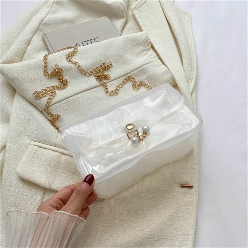 Bolso de hombro con cadena transparente para mujer y niña, bolsa pequeña de gelatina de Color caramelo, bandolera transparente de PVC